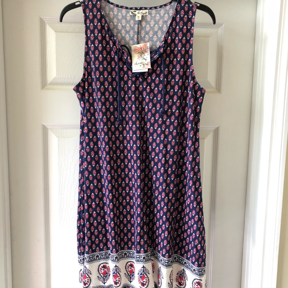 Super cute never worn summer sleeveless dress.